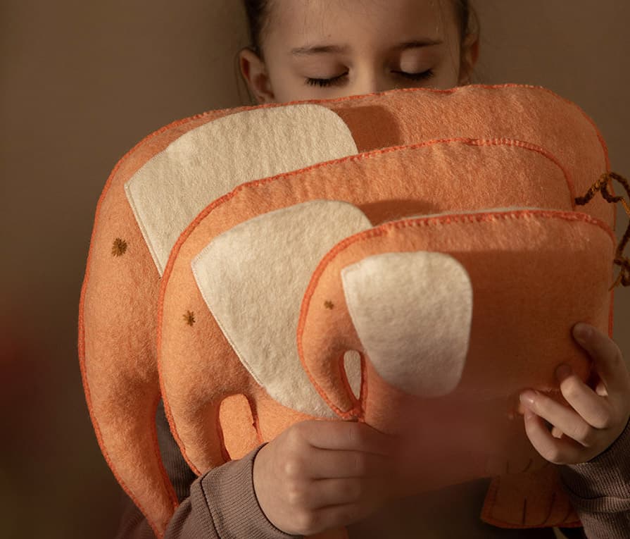 Trio of elephant-shaped cushions for the children’s room