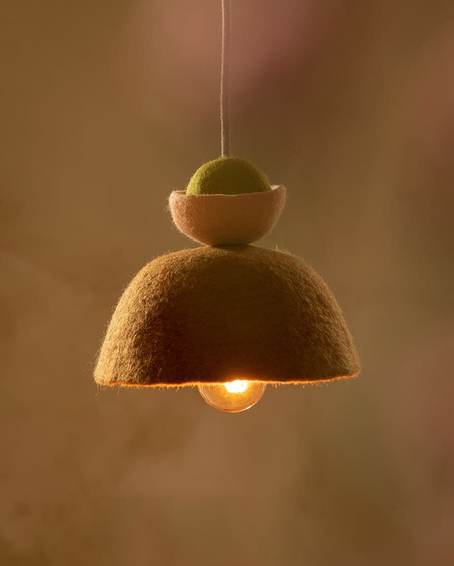 Graphic, designer pendant light made of wool felt